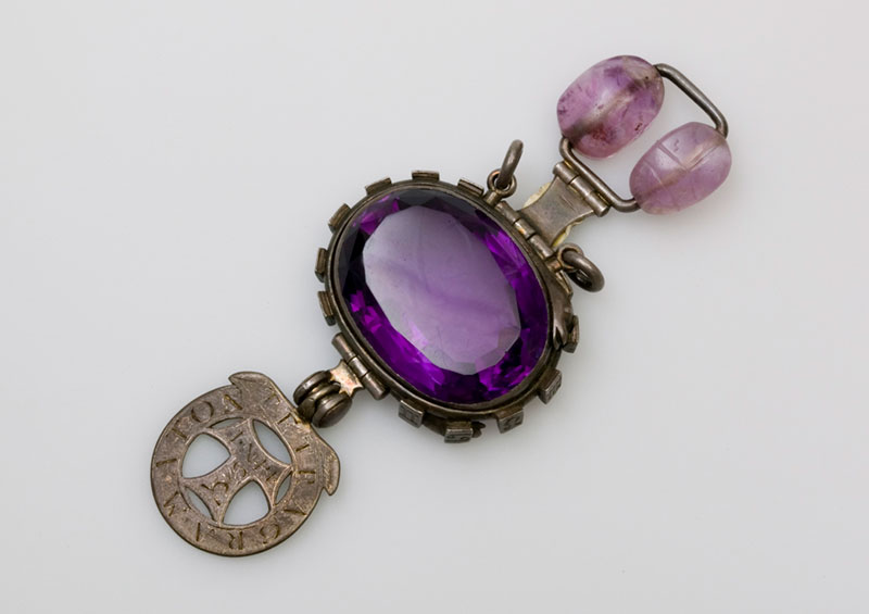 The 'cursed amethyst', mounted in silver with two hinged pendants