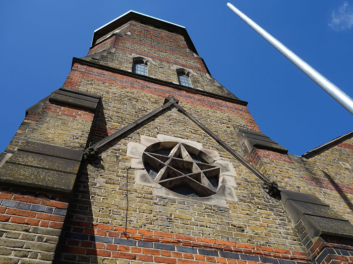 A pentagram on the exterior of St Barnabas at Bethnal Green