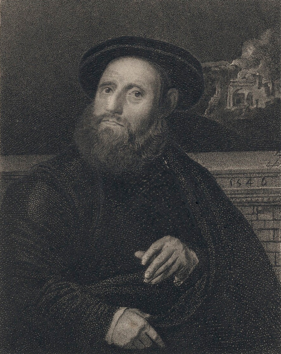 An engraving of a man wearing a hat and a cloak wrapped around himself. He's sitting in front of a brick wall with a building in the background.