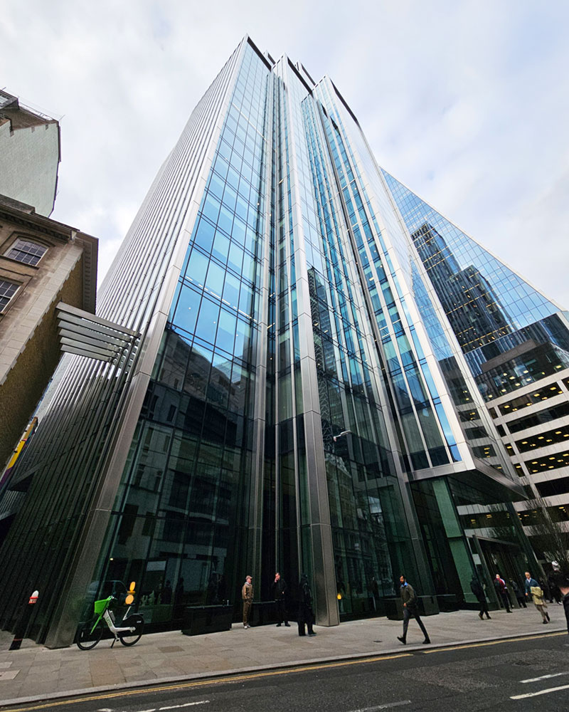 A steel and glass high-rise building.