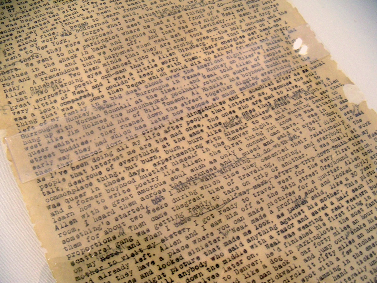 A type-written manuscript, brown with age and with some torn edges